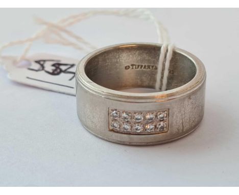 A heavy silver stone set ring bearing Tiffany stamp size U 