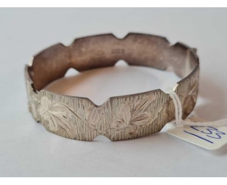 A modernistic silver bangle - 32 gms 