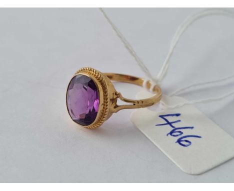 An oval stone amethyst ring 9ct size H 1/2 - 1.7 gms 