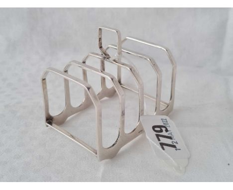 A five bar toast rack with ring handle, Birmingham 1946, 56g