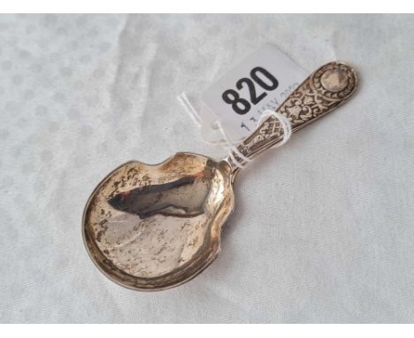 A Victorian Exeter silver tea caddy spoon with chased stem, 1880 by JW