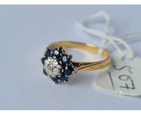 A diamond and sapphire ring 18ct gold size O - 3.9 gms 