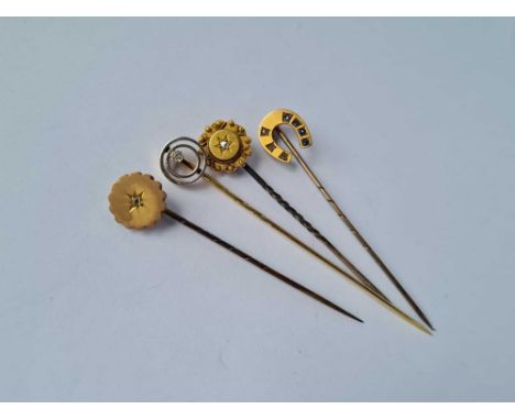 Four antique stick pins 2 x 15ct and 2 x 9ct