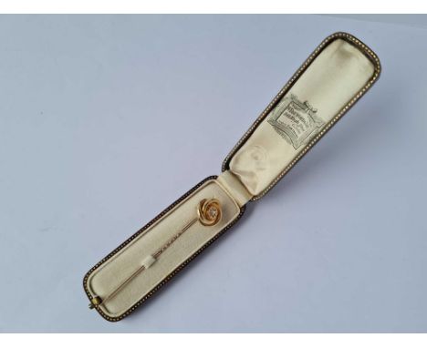 An antique gold &amp; diamond stick pin in antique box 3.7g inc