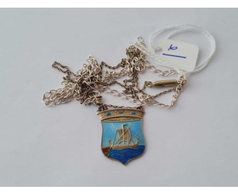 A silver and enamel pendant depicting a Viking boat on chain together with a silver neck chain 