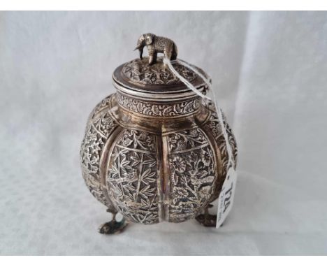 An Indian silver tea caddy with ribbed body, elephant finial and fish feet, 4.5" high, 195g