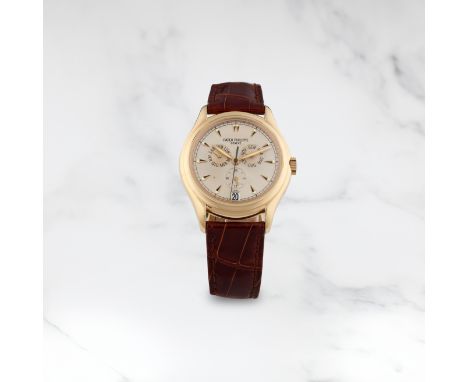 PATEK PHILIPPE. MONTRE BRACELET EN OR ROSE 18 CARATS CALENDRIER ANNUEL MOUVEMENT AUTOMATIQUE COMMEMORANT LE 100E ANNIVERSAIRE