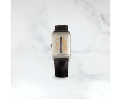 JAEGER-LECOULTRE. MONTRE BRACELET EN OR BLANC 18 CARATS RECTANGULAIRE REVERSIBLE MOUVEMENT MECANIQUE EDITION LIMITEE COMMEMOR
