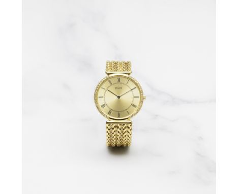 PIAGET. MONTRE BRACELET EN OR JAUNE 18 CARATS TAILLE MEDIUM SERTIE DE DIAMANTS MOUVEMENT MECANIQUEPIAGET. A MID-SIZE 18K GOLD