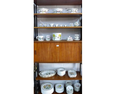 A Collection of Portmeirion Botanic Garden tableware, including bowls and plates, serving dishes, measuring cups, butter dish