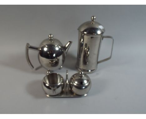 A Modern Four Piece Stainless Steel Tea Service