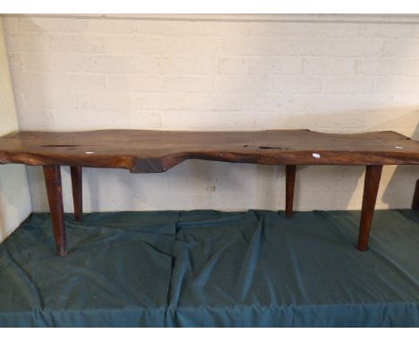 An Elm Top Garden Seat in the Form of a Pig Bench, 60cm Long 