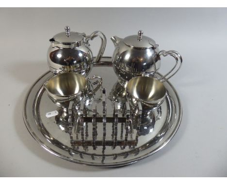 A Stainless Steel Old Hall Cottage Four Piece Tea Service, Together with Toast Rack and Circular Tray 