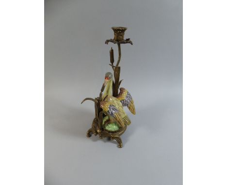 A Continental Ceramic and Ormolu Candle Stick in the Form of a Bird In Bullrushes, 21cm 