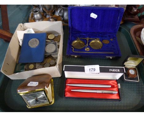 A Box Containing Various Coins and Bank Note, Cased Set of Scales, Parker Pen Set, Travel Alarm Clock 