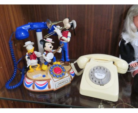 A VINTAGE DISNEY MICKEY'S DIXIE LAND BAND AUTOMATON MUSICAL TELEPHONE TOGETHER WITH A VINTAGE BELL RING TELEPHONE (2)