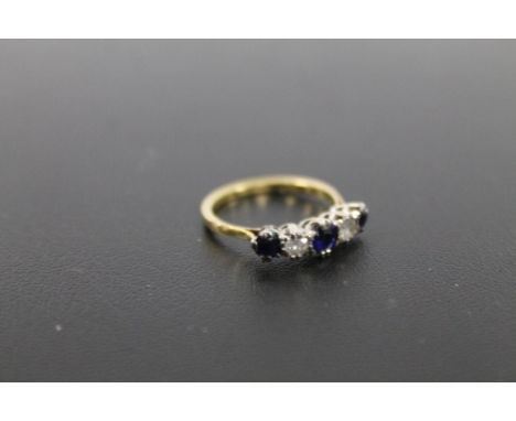 AN 18CT GOLD FIVE STONE SAPPHIRE AND DIAMOND RING approx weight 2.3g