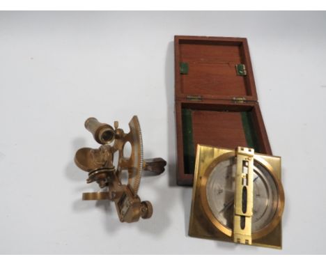 A WOODEN BOXED BRASS COMPASS TOGETHER WITH A SMALL BRASS THEODOLITE BY STANLEY, LONDON