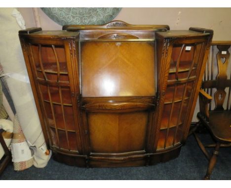 A MID 20TH CENTURY BOW FRONTED BUREAU