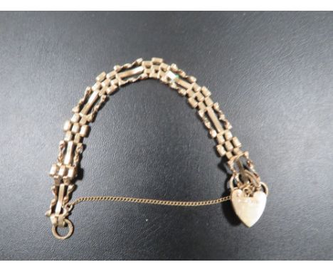 A HALLMARKED 9CT GOLD GATE BRACELET approx weight 9g