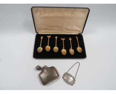 A SET OF SHAKESPEARE SOUVENIR SPOONS, SILVER WINE LABEL AND SILVER PLATED SPRIT FLASK