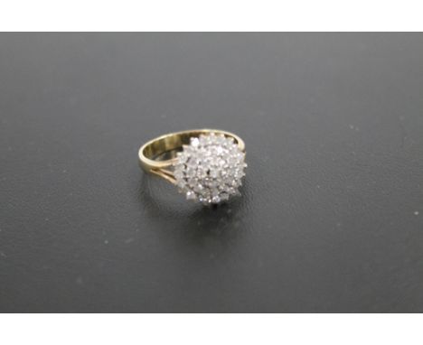 A HALLMARKED 9 CARAT GOLD DIAMOND CLUSTER RING, set with an estimated half carat of diamonds, approx weight 3.1g, ring size Q