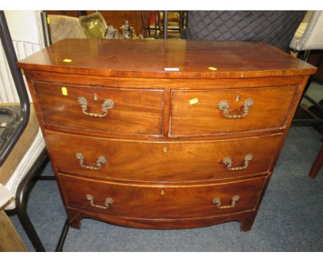 AN ANTIQUE MAHOGANY BOW FRONTED FOUR DRAWER CHEST - W 88 cm