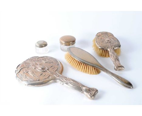 A part set of Art Nouveau silver mounted dressing table wares, William Aitken, Birmingham 1903, comprising; a hand mirror, ha