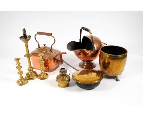 A collection of antique metal wares to include a large 18th century warming pan, the incised brass cover decorated with a lar