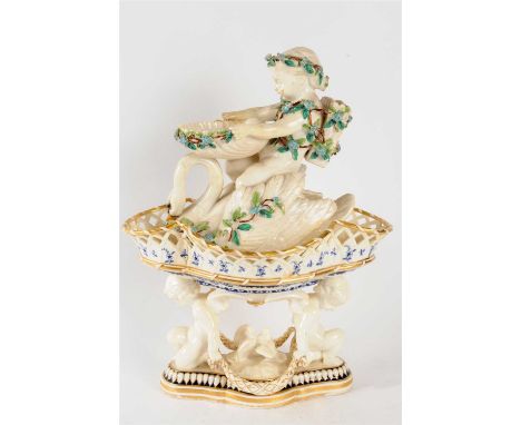 A mid-19th century table centrepiece, the pierced basket supported by two putto holding a wreath surrounding pair of doves, 2