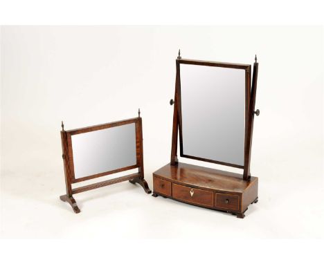 A 19th century mahogany veneered dressing table mirror with three drawers to the base, together with a smaller mahogany frame