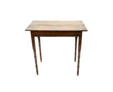 A small 18th century country oak side table, the planked top above squared and tapering turned legs, 75 cm high, the top meas