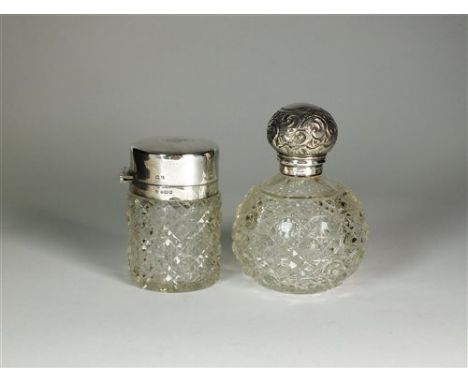 A silver mounted glass dressing table jar, Charles S Green &amp; Co, Birmingham 1917, with engraved monogram to the cover, 9c