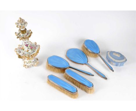 A silver and blue guilloche enamel four-piece dressing table set comprising three brushes and one handheld mirror together wi