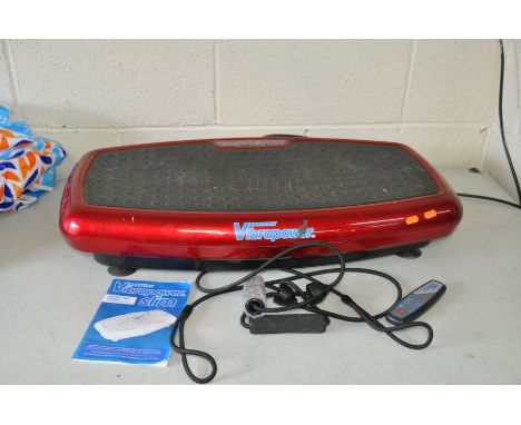 A VIBRAPOWER SLIM MODEL No JF-B-01 with remote, manual and two strap handles ( PAT pass and working