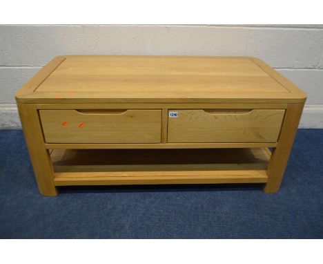 A SOLID LIGHT OAK COFFEE TABLE with two drawers and an undershelf, width 110cm x depth 60cm x height 46cm (good condition)