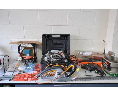 A SELECTION OF POWER TOOLS comprising of a Powerbase Excell Circular Saw, a Titan Electric Hedge Trimmer, a Performance Power