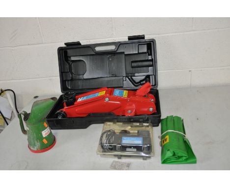 A CASED HILKA 2 TONNE TROLLEY JACK (no bar), a vintage Halfords Castrol Oil can, an AA spanner set and a Hilka Mini Tyre infl
