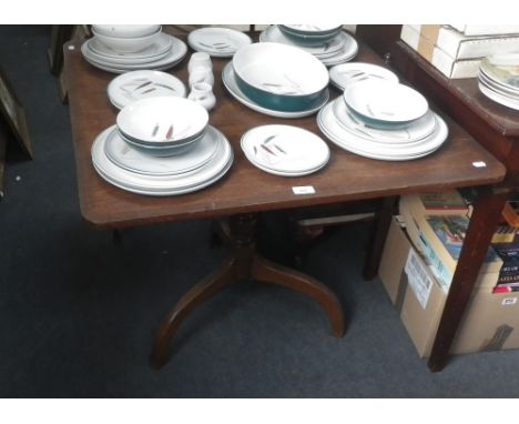 A George III oak and mahogany cross banded tripod table  