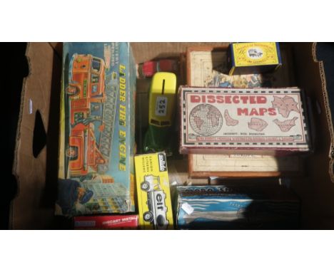 A quantity of vintage toys including a fire engine, jigsaw maps and other items 