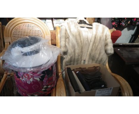 A collection of vintage ladies handbags, a cream fur short cape and a collection of hats and gloves 