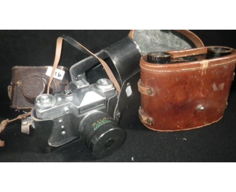 A vintage Diax camera, binoculars and similar items 
