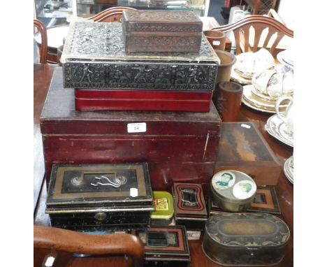 A collection of vintage tins, money boxes and similar items 