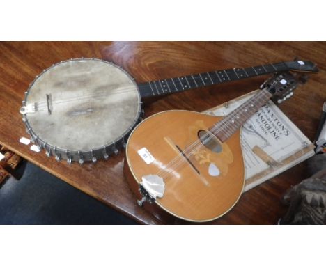 A vintage ukulele and a mandolin 