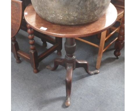 A George III walnut tripod table  
