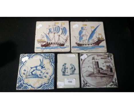 A blue and white Delft tile decorated with a leaping hare, two polychrome tiles and others similar 