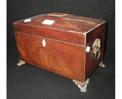 A Regency mahogany tea caddy, with gilt metal fittings 