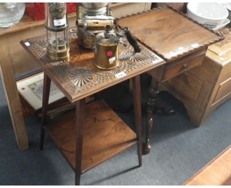 A mahogany work table fitted with two drawers on a tripod support and a carved occasional table (2)  