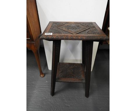 Carved Oak Table with Shelf under 