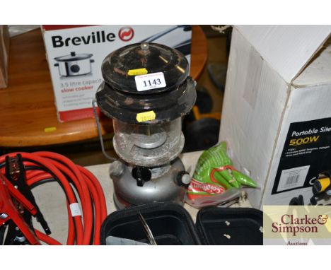 A Coleman dual mantel petrol lamp
